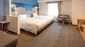 A hotel room with a large bed, two bedside tables, a small desk, a chair, and a window with curtains. - Comfort Suites Tokyo Bay (Urayasu)