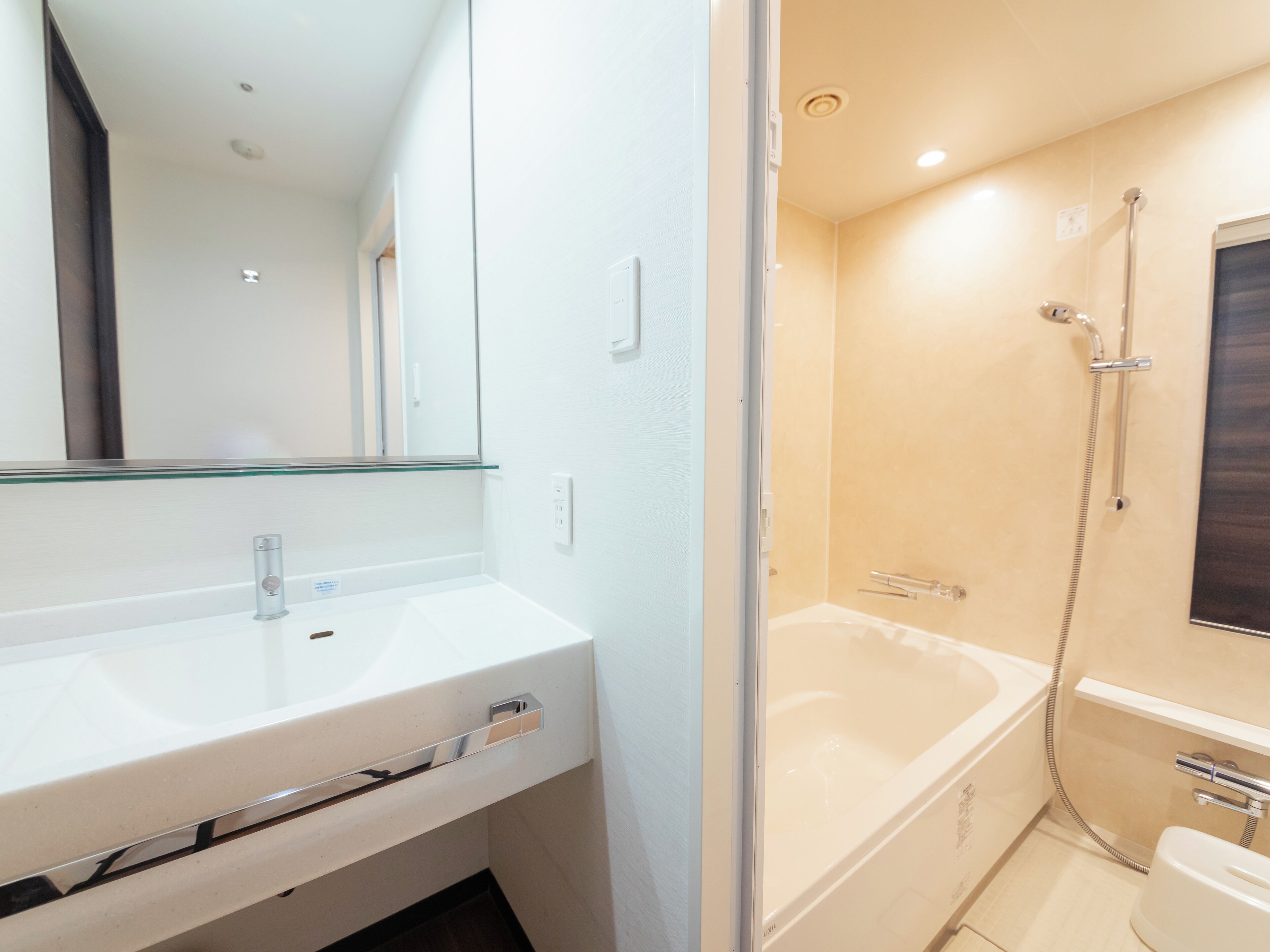 separate bathtub and shower, deep-soaking bathtub, free toiletries