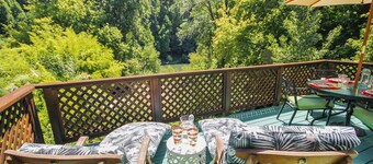 Roskamp ~ Riverfront Cabin with Large Yard, Seasonal River Dock & Boats