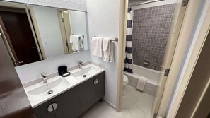 Shower, hair dryer, towels