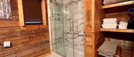 Shower, hair dryer, towels