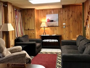 Smart TV, fireplace, table football, books