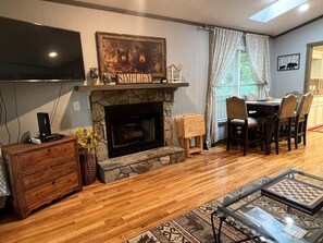 Smart TV, fireplace, table tennis, books