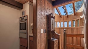 A kitchen with wooden cabinets, a built-in oven, and a skylight. - Unique 3 Story with Two Great Entertainment Areas! Short drive to Lake and Northstar! (Kings Beach)