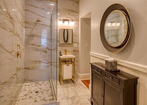 Bathtub, jetted bath, hair dryer, towels