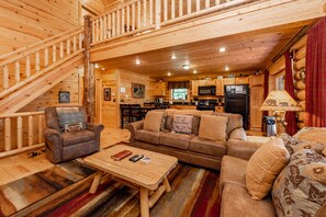 Een televisie, een open haard en tafelvoetbal