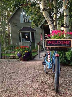 Welcome to this charming single-story house with a cozy front porch and a small window above the door.