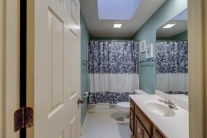 Bathtub, hair dryer, towels