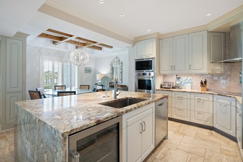 Memories Await, A Beautiful, Ocean View Villa featuring a wet bar, flat screens and wifi.