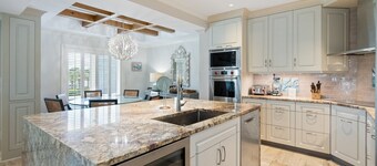 Memories Await, A Beautiful, Ocean View Villa featuring a wet bar, flat screens and wifi.