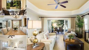 A spacious living area with a ceiling fan, a dining table, and a sofa. - Ground Floor Luxury Condo | Fully Furnished | Very Close to Disney! (Kissimmee)