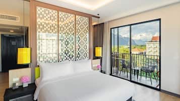 Deluxe Room, 1 King Bed, Balcony, City View | Premium bedding, minibar, in-room safe, individually furnished