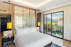 Deluxe Room, 1 King Bed, Balcony, City View | Premium bedding, minibar, in-room safe, individually furnished - Amari Vang Vieng (Vang Vieng)