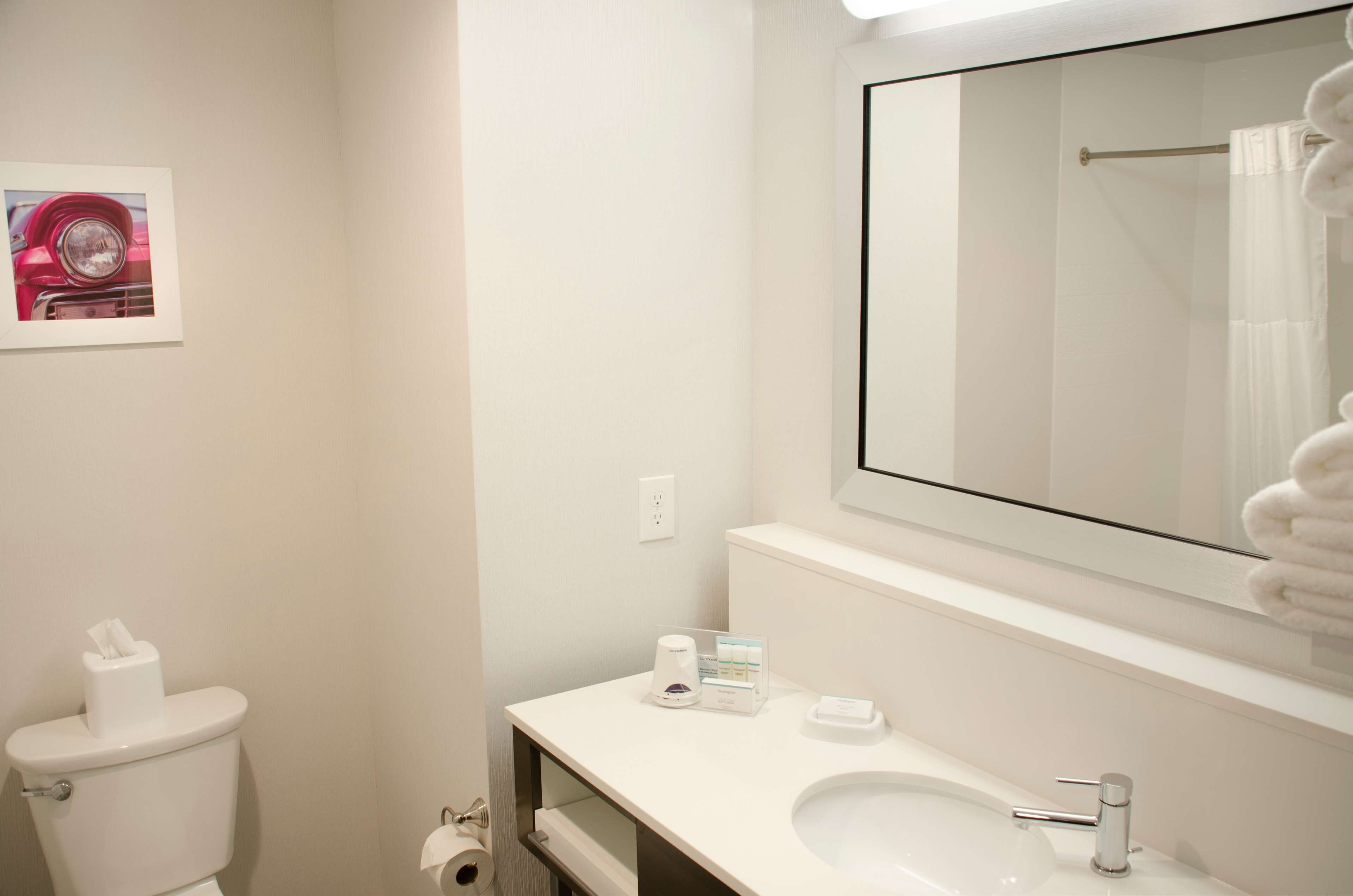 room, 2 queen beds, refrigerator & microwave | bathroom | free toiletries, hair dryer, towels