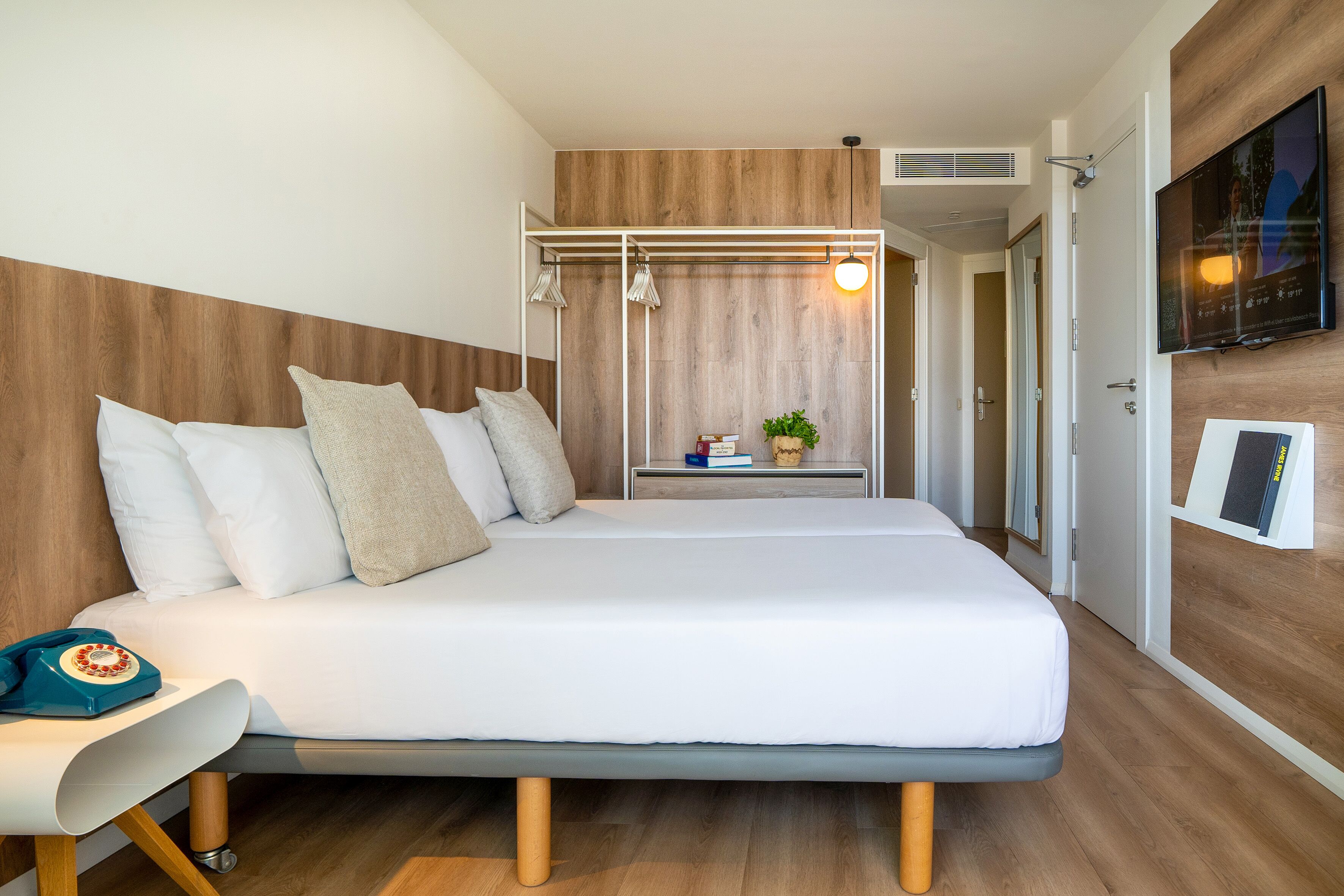 Habitació | Llençols de cotó egipci, roba de llit d'alta qualitat i minibar 