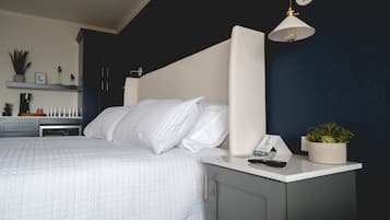 Blackout drapes, iron/ironing board, free cribs/infant beds