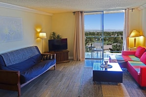 Comfort Suite, 2 Bedrooms, Kitchen, Mountain View | Living area | Flat-screen TV, fireplace - Country Club Luxury Suites (Las Vegas)