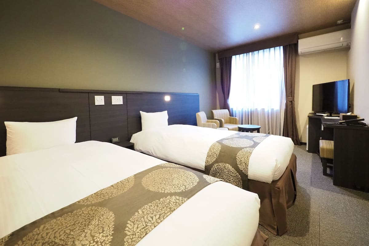Desk, blackout curtains, free WiFi, bed sheets