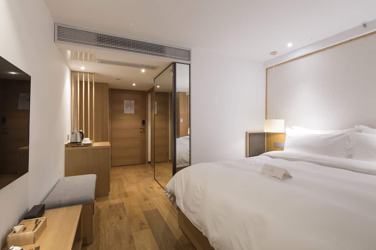 Comfortable King-Size Room | Premium bedding, down duvets, desk, blackout curtains