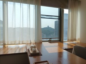 Standard King-Size Room | Living area | 50-inch LCD TV with digital channels, TV, printers