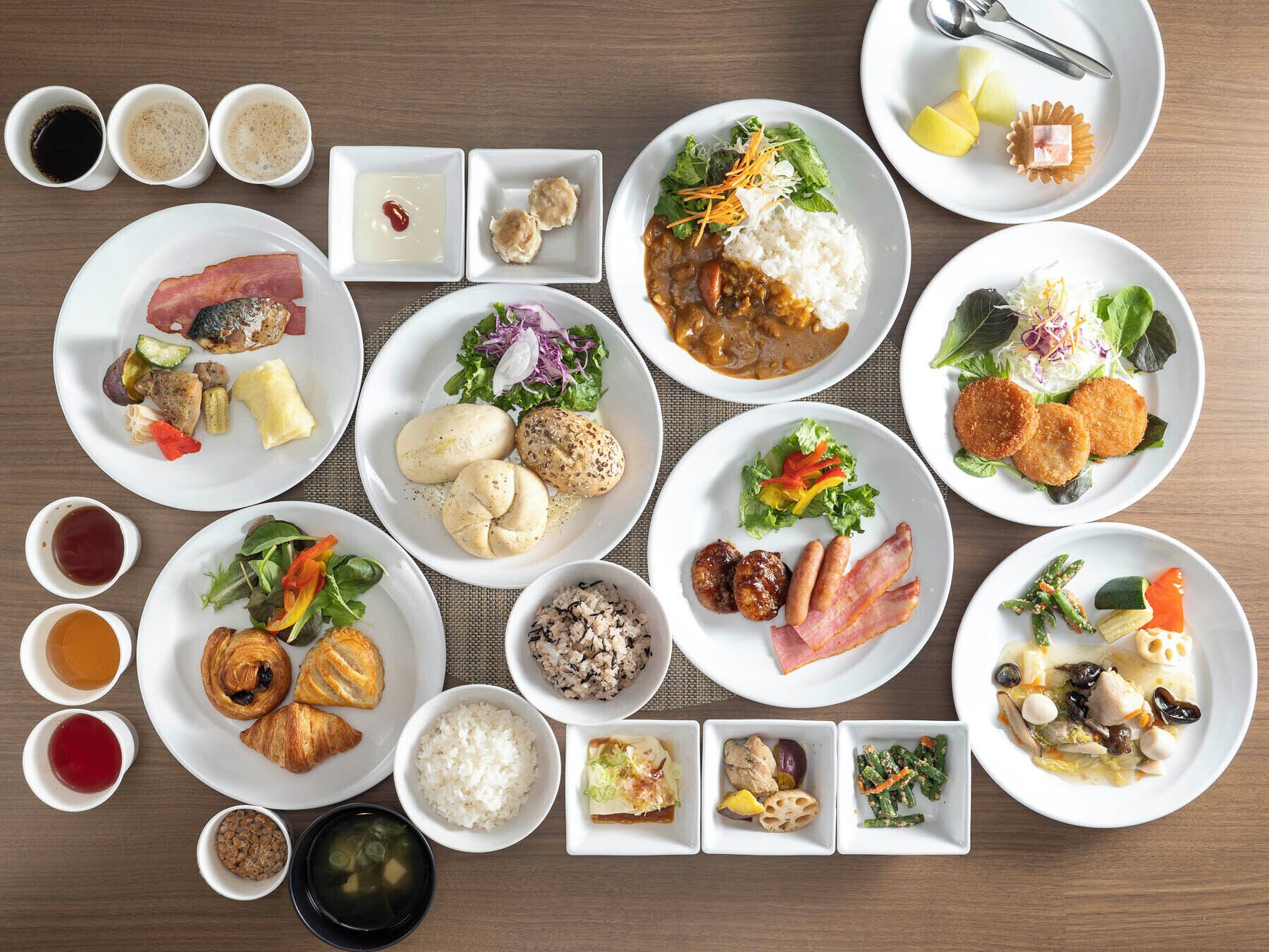 A variety of dishes and condiments arranged on a table.