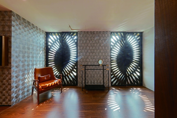 Kamar Quadruple Superior | Selimut bulu angsa, minibar, meja kerja, dan tirai kedap cahaya