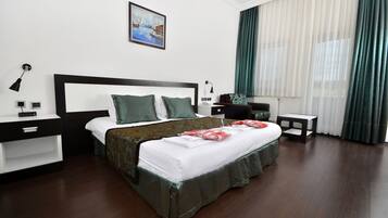 Superior Room | Minibar, in-room safe, desk, soundproofing