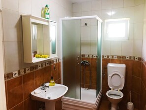 Shower, free toiletries, hair dryer, towels