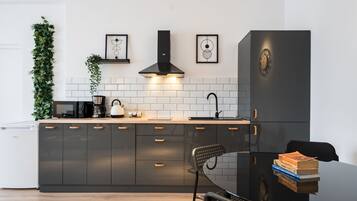 Executive Apartment, 1 Bedroom, City View | Private kitchen | Coffee/tea maker, fridge, microwave, stovetop