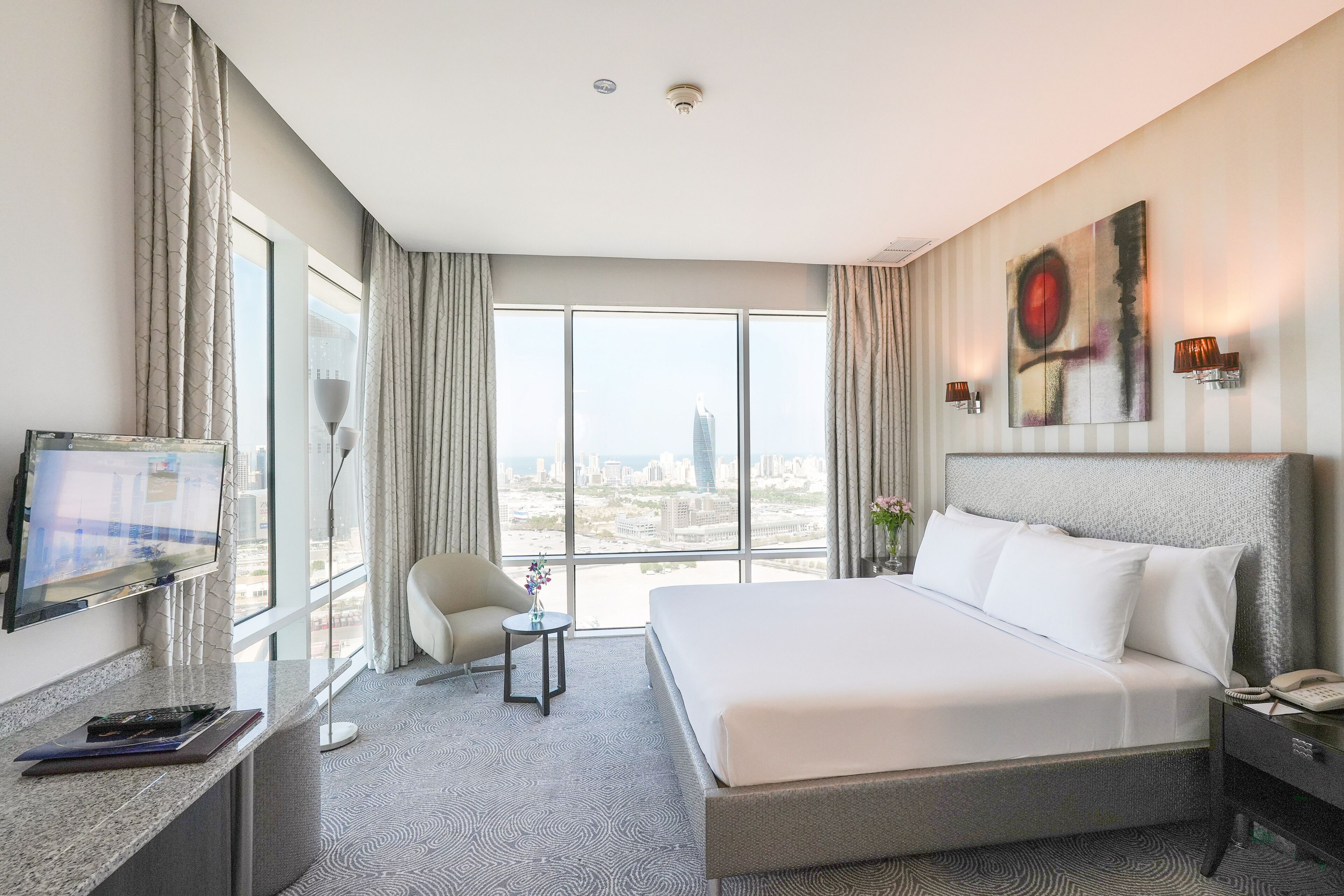deluxe double room, 1 king bed | premium bedding, minibar, in-room safe, desk
