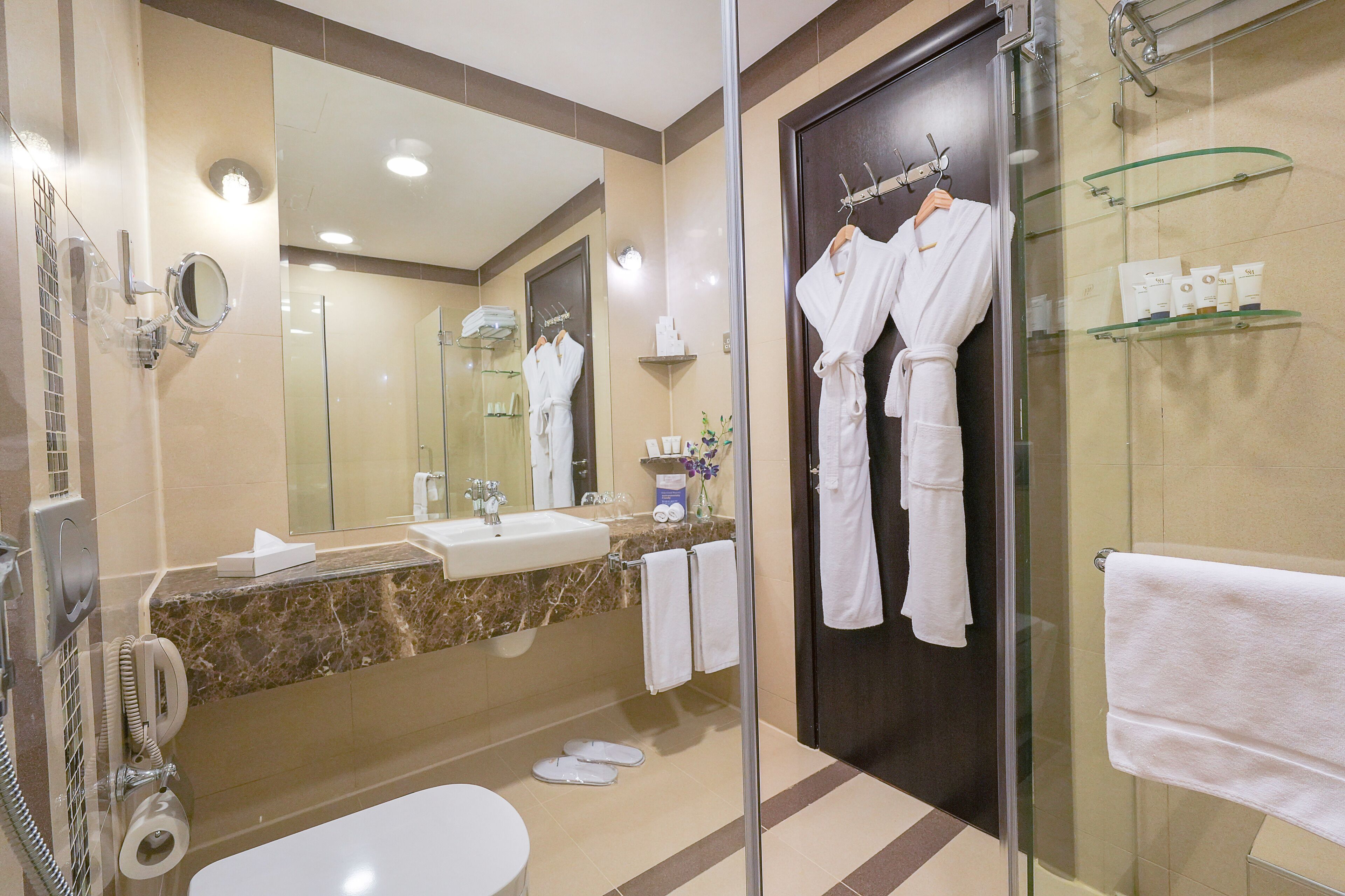 executive suite | bathroom | shower, free toiletries, hair dryer, bathrobes