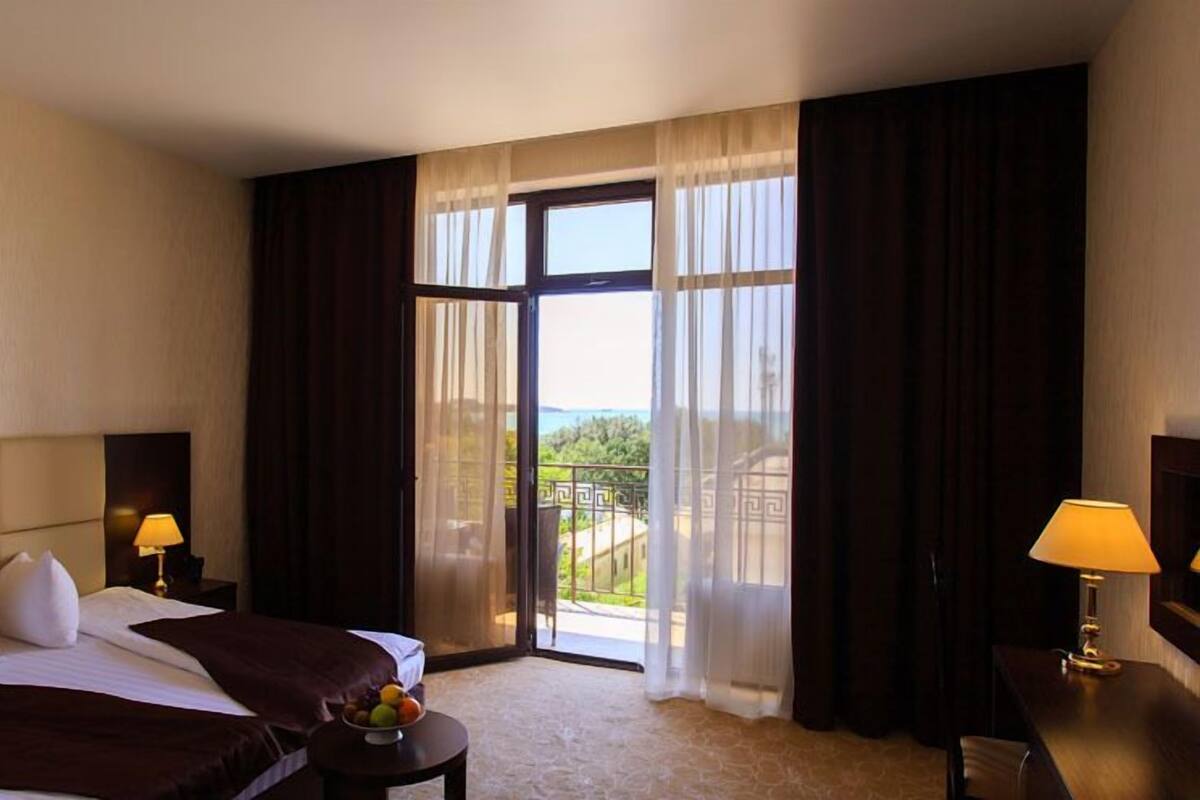 Standard Double Room, Balcony, Sea View | In-room safe, individually furnished, desk, blackout drapes