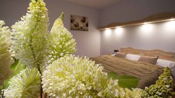 Comfort Suite, 1 Bedroom, Garden Area | In-room safe, blackout drapes, iron/ironing board, cribs/infant beds