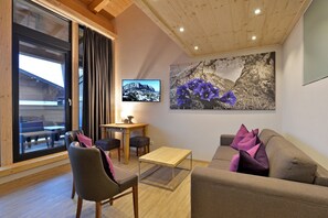 Family Apartment, 2 Bedrooms, Balcony, Pool View | Living area | 0-inch flat-screen TV with satellite channels, TV, heated floors