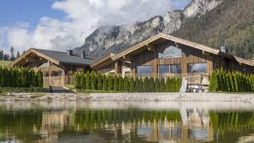 Seasonal outdoor pool, open 6:00 AM to 9:00 PM, pool umbrellas