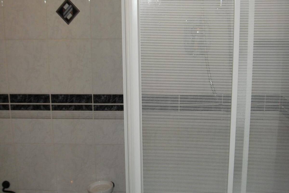 shower, free toiletries, slippers, bidet