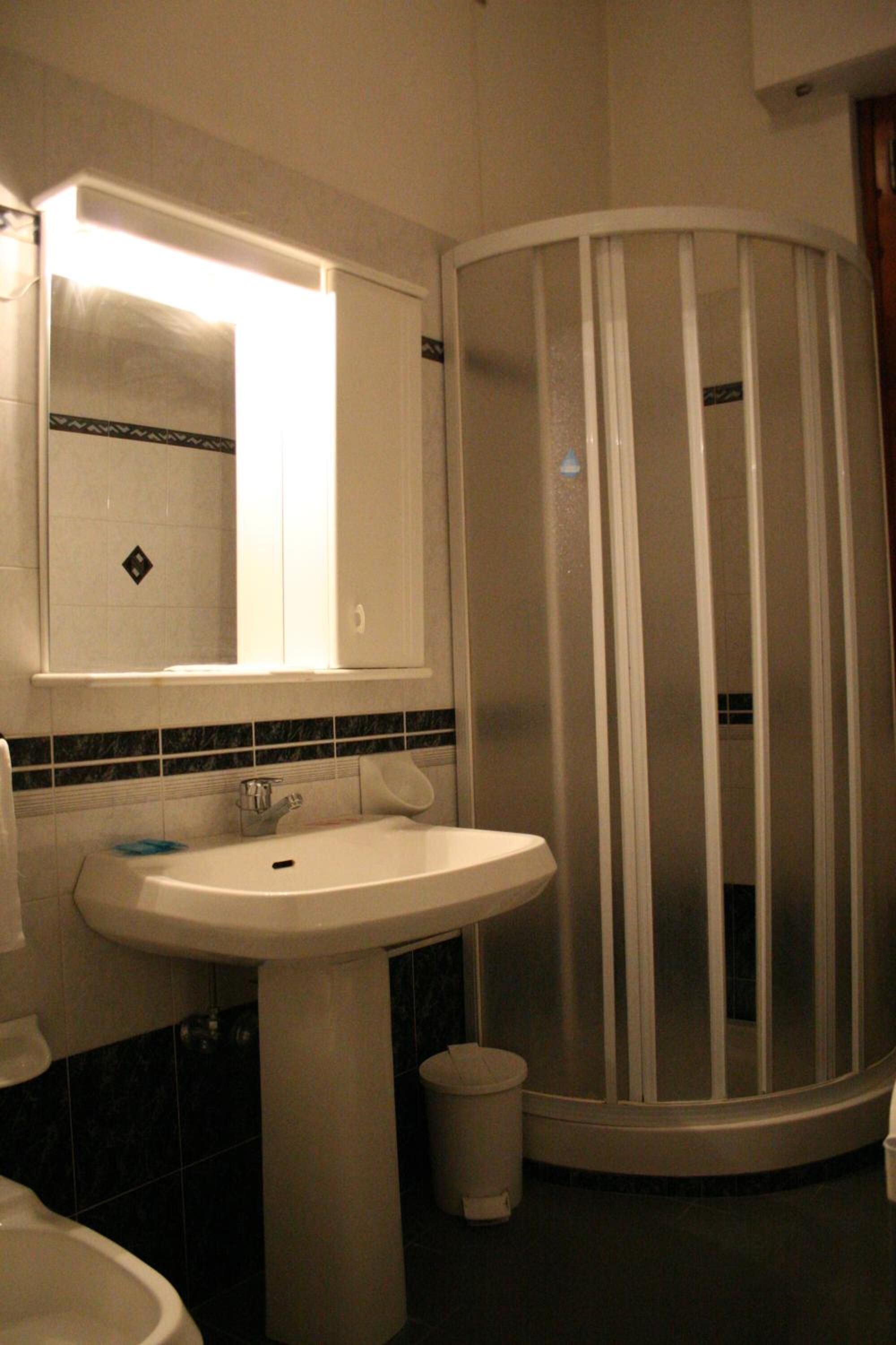 shower, free toiletries, slippers, bidet