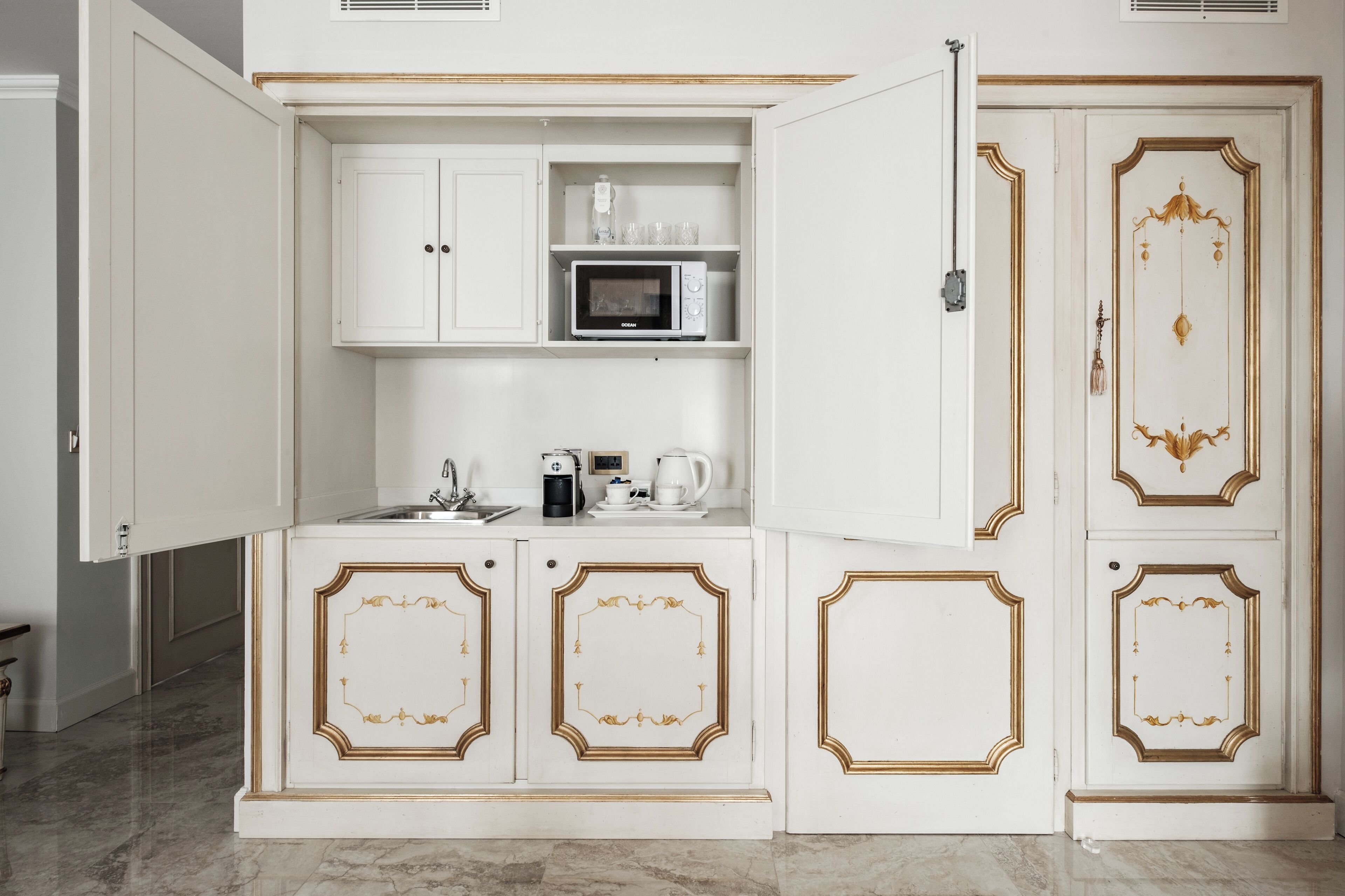 signature suite | private kitchenette | espresso maker, coffee/tea maker, electric kettle