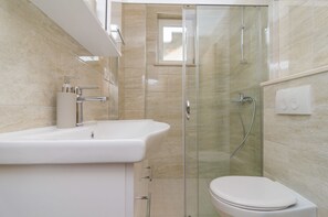 Apartment, 1 Bedroom, Terrace, Sea View | Bathroom | Shower, hair dryer, towels, toilet paper