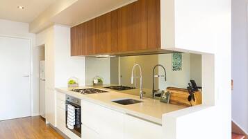 Executive House, 3 Bedrooms, Kitchen, City View | Private kitchen | Full-size fridge, oven, stovetop, cookware/dishes/utensils