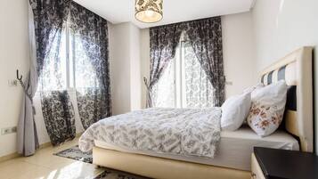 Blackout curtains, iron/ironing board, free WiFi, bed sheets