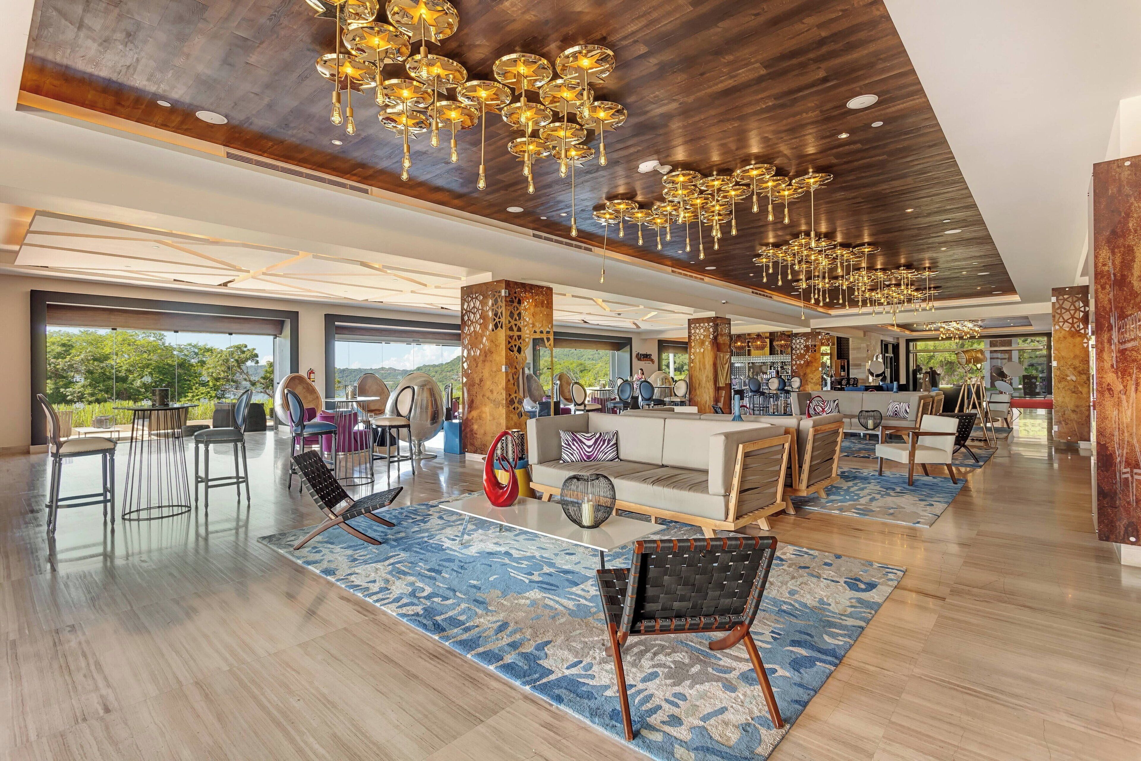 3 bars/lounges, poolside bar, beach bar