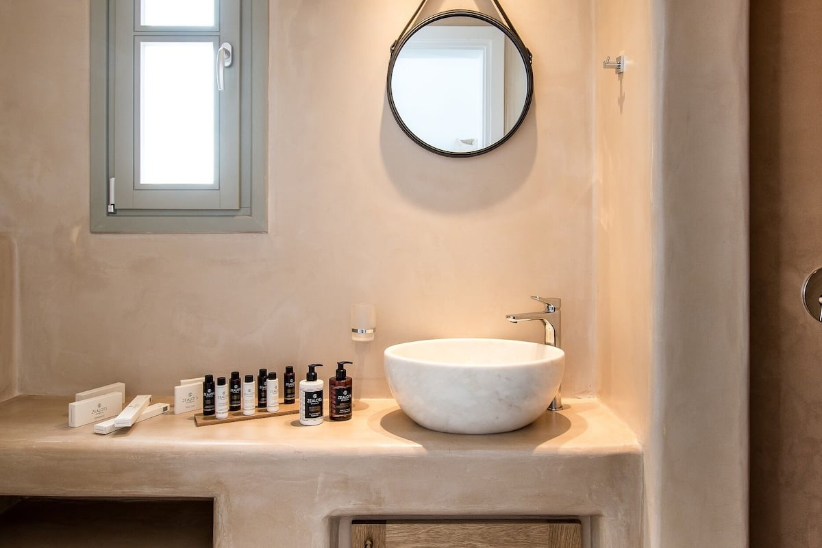 shower, rainfall showerhead, hair dryer, towels