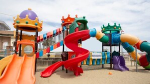 A playground with slides and climbing structures. - Hotel Villa Donati (Rimini)