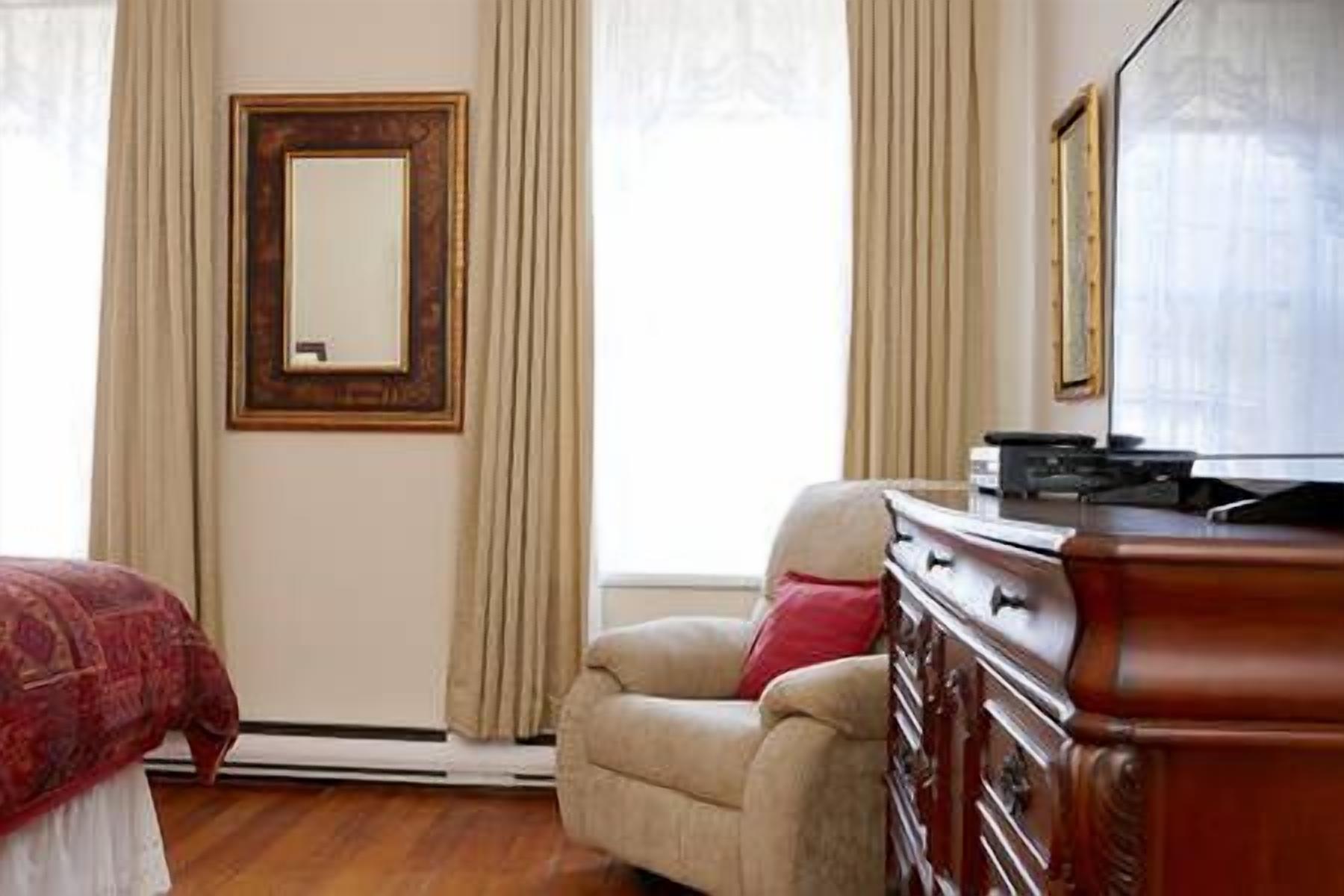 suite, 1 king bed | living area | 55-inch tv with cable channels