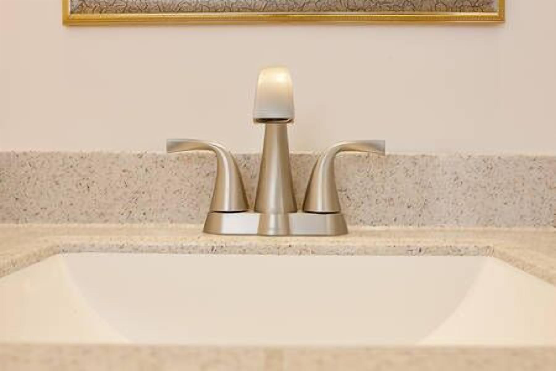 suite, 1 king bed with sofa bed | bathroom sink