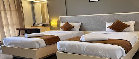 Economy Room | 1 bedroom, desk, blackout drapes, iron/ironing board