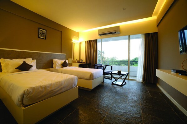 Desk, blackout drapes, iron/ironing board, rollaway beds