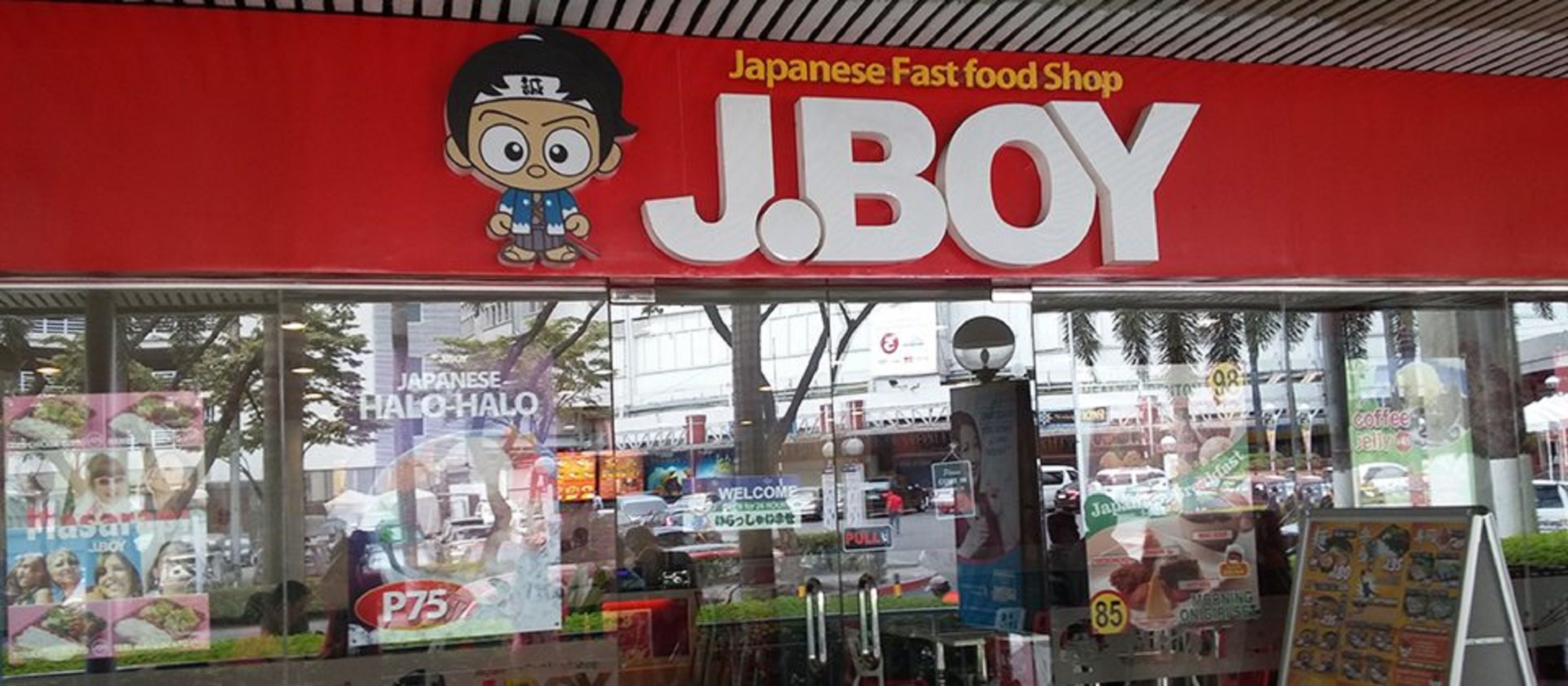 A J.BOY Japanese fast food shop with a large cartoon character logo.