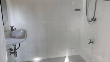 Shower, free toiletries, hair dryer, slippers